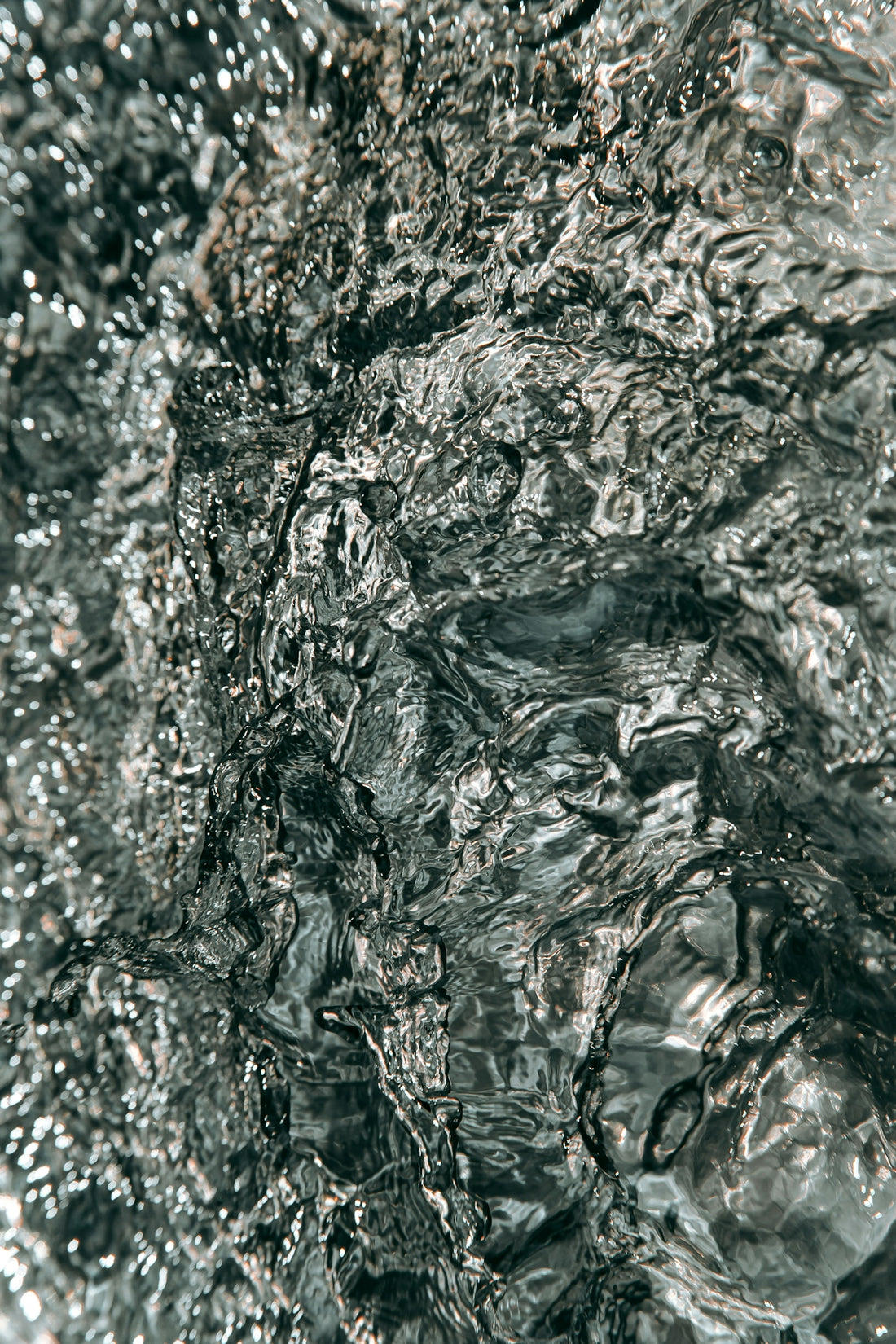 water splash on brown rock